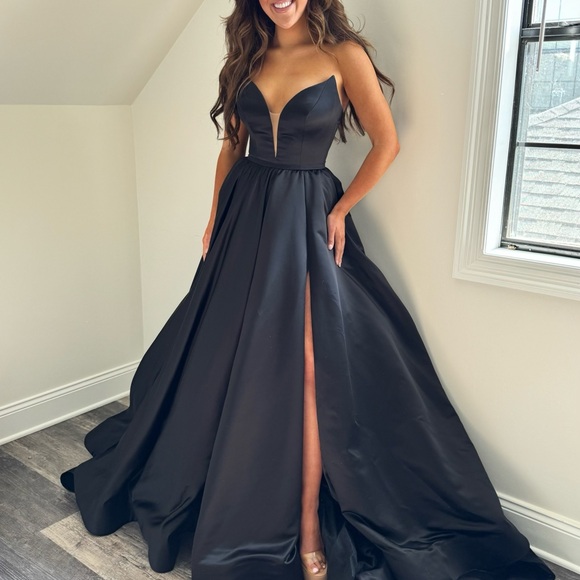 Jovani Dresses & Skirts - Jovani Couture Black Gown with Slit and Plunge Neckline